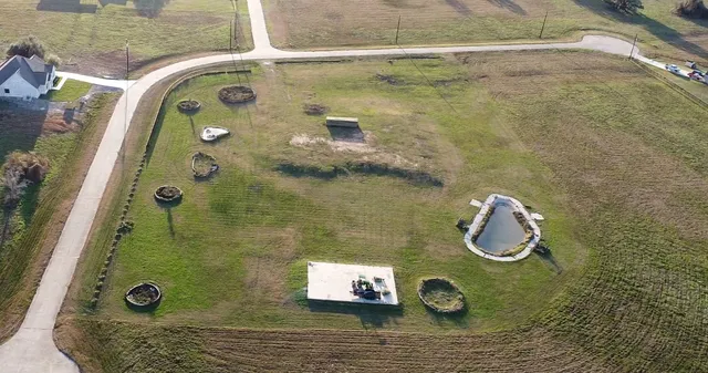a bathroom with a tub and shower