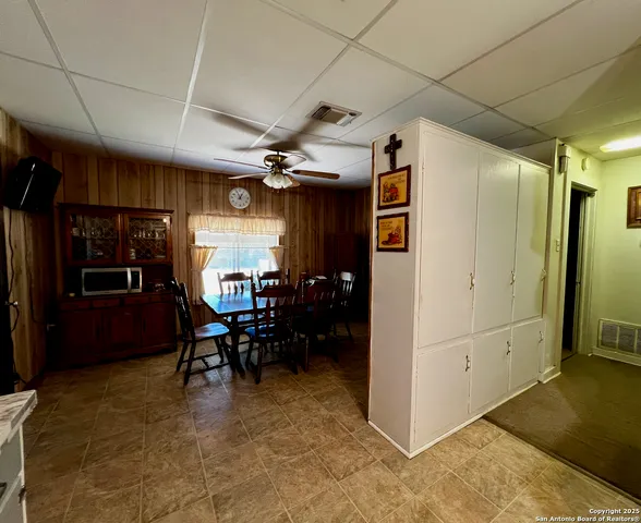 a view of a livingroom with furniture