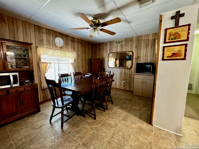 a view of a dining room with furniture