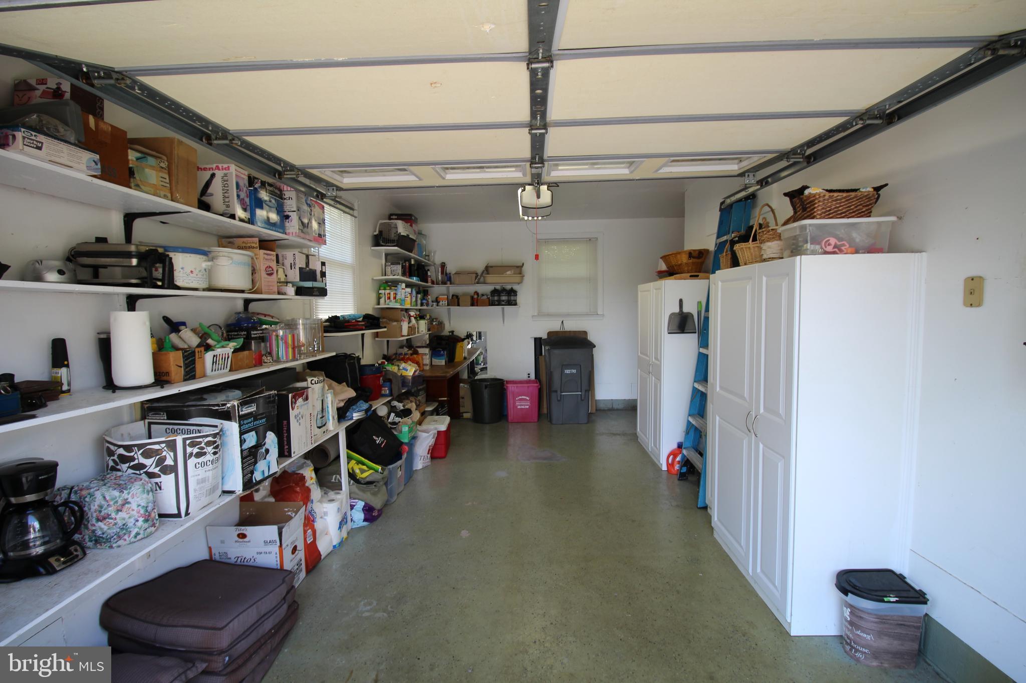 835 Spring City Road Phoenixville, PA 19460 - Photo 44 of 47 Inside garage w/blt in shelving and add'l units