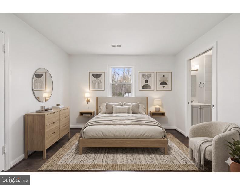 16206 Ashbox Road Brandywine, MD 20613 - Photo 14 of 20 Serene bedroom with modern elegance.