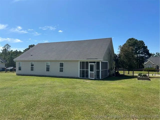 a view of a lake with a big yard