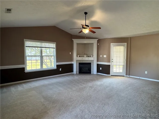 a living room with a fireplace