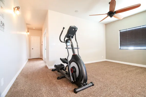 a view of a room with gym equipment