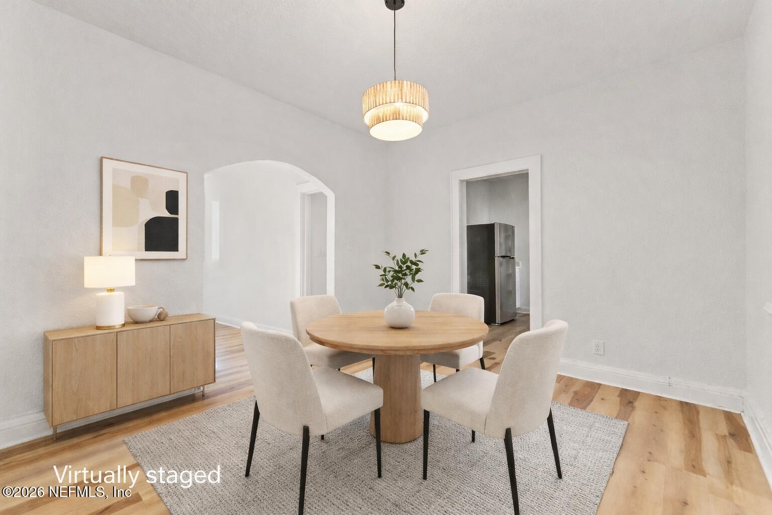 449 Sunset Drive Jacksonville, FL 32208 - Photo 14 of 31 Modern dining room with abstract art