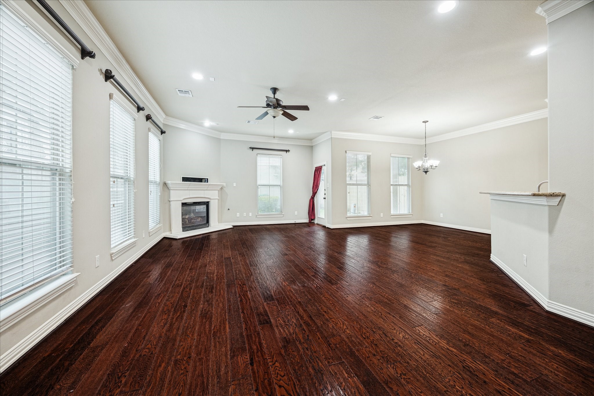 2 Schwab Lane Houston, TX 77055 - Photo 22 of 27 a view of a room with wooden floors and fireplace