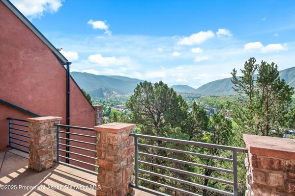 a balcony view with an outdoor space