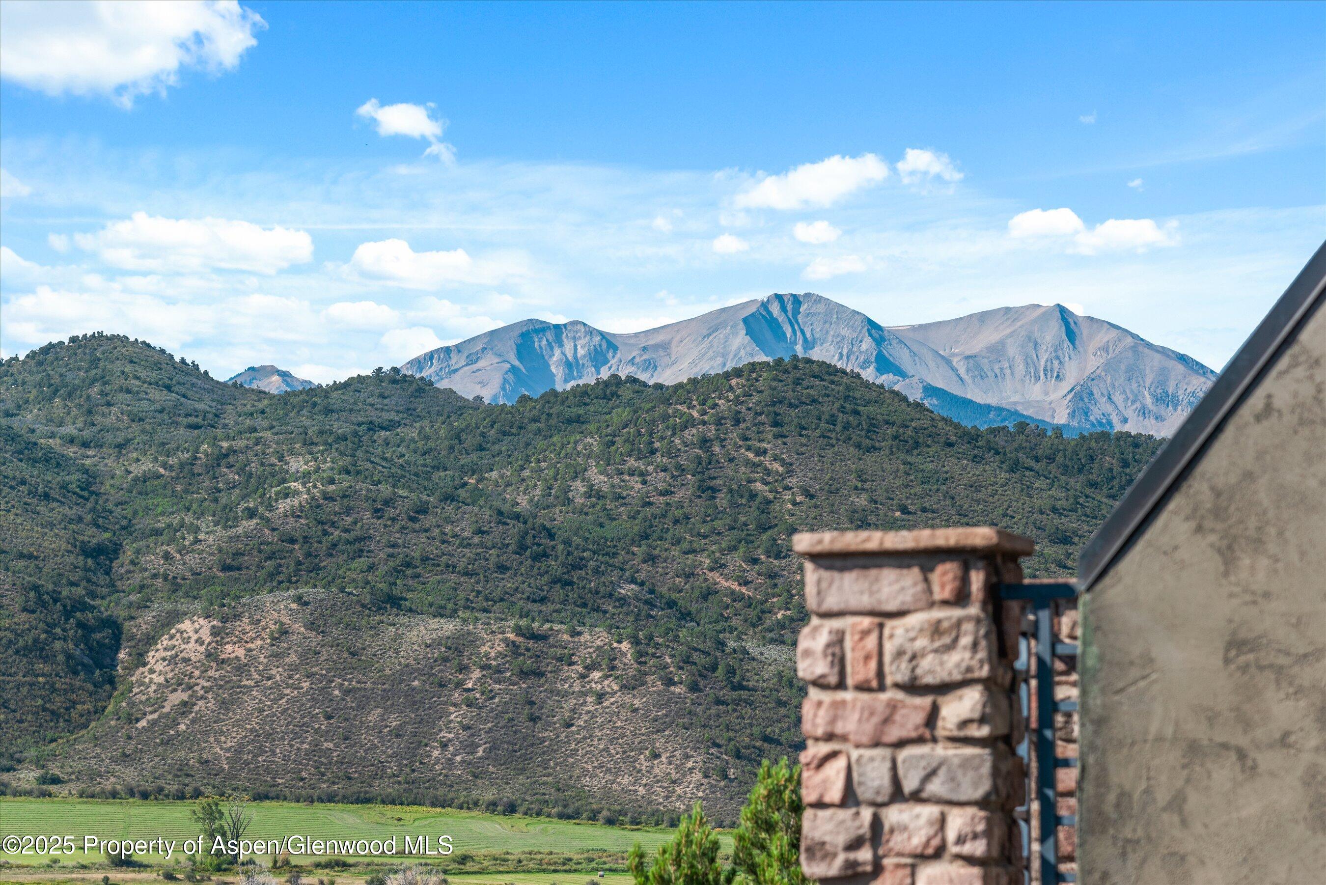 404 Wild Spring Lane Basalt, CO 81621 - Photo 16 of 30 a view of a house with a yard