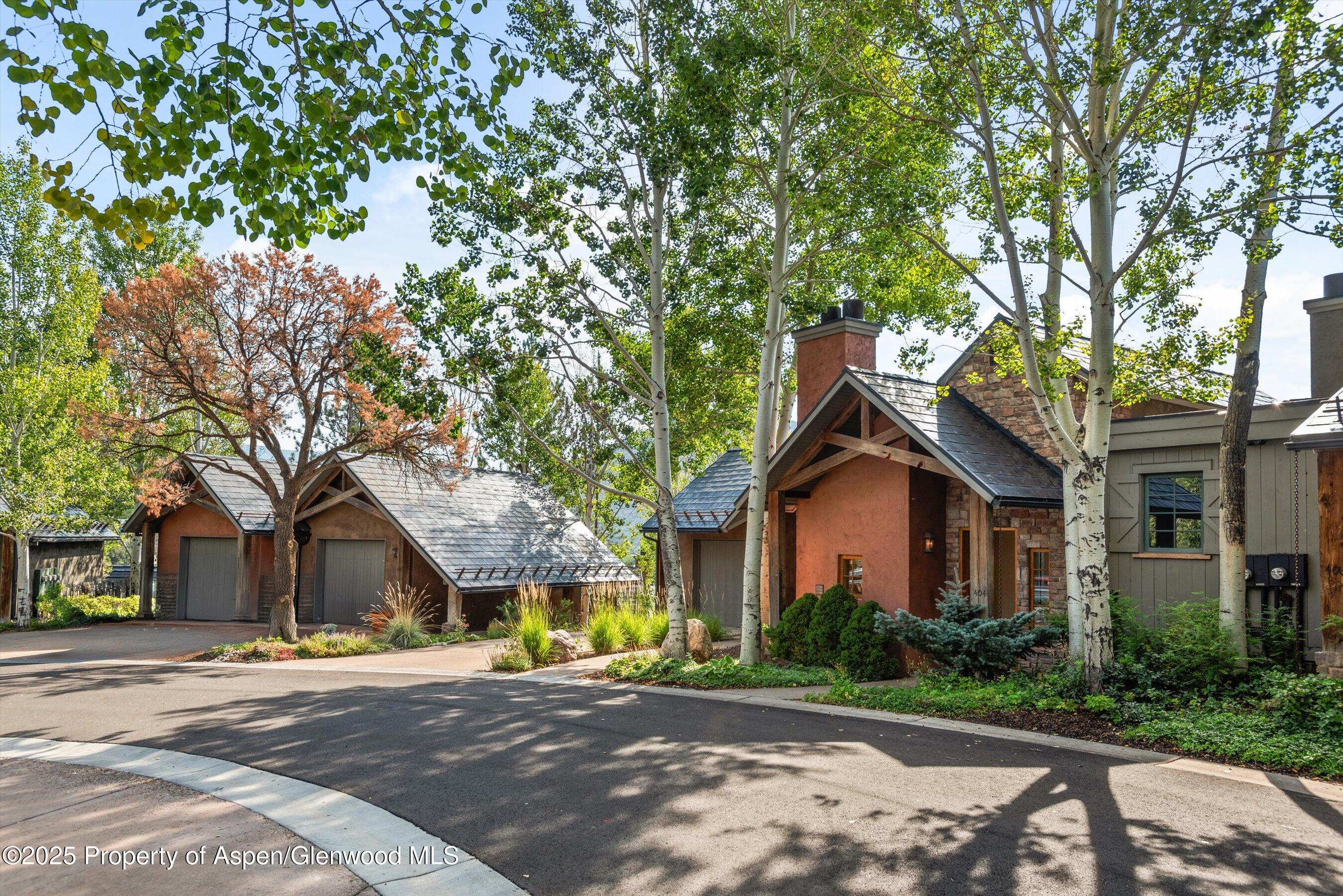 404 Wild Spring Lane Basalt, CO 81621 - Photo 2 of 30 a view of a house with a tree and a big yard