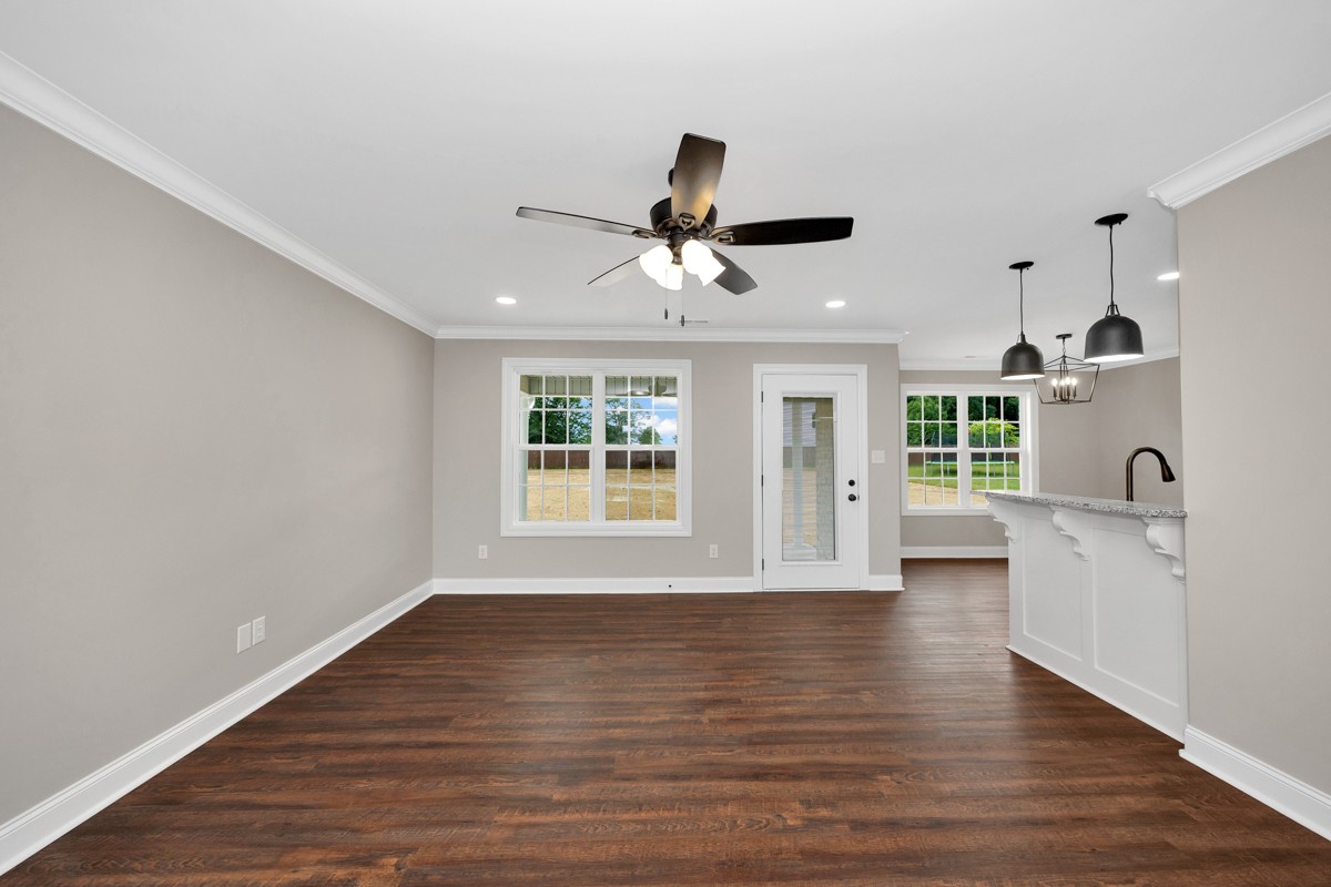 27025 North Wales Road Elkmont, AL 35620 - Photo 13 of 40 a view of an empty room with a window and wooden floor