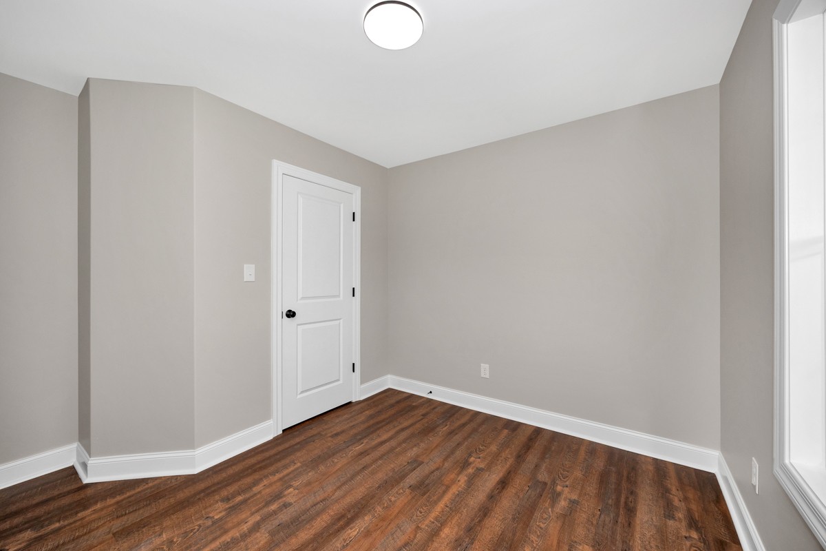 27025 North Wales Road Elkmont, AL 35620 - Photo 29 of 40 a view of a room with wooden floor and white walls