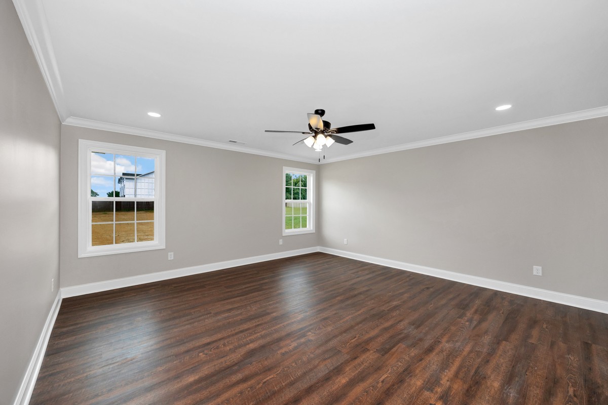 27025 North Wales Road Elkmont, AL 35620 - Photo 33 of 40 a view of an empty room with a window and wooden floor