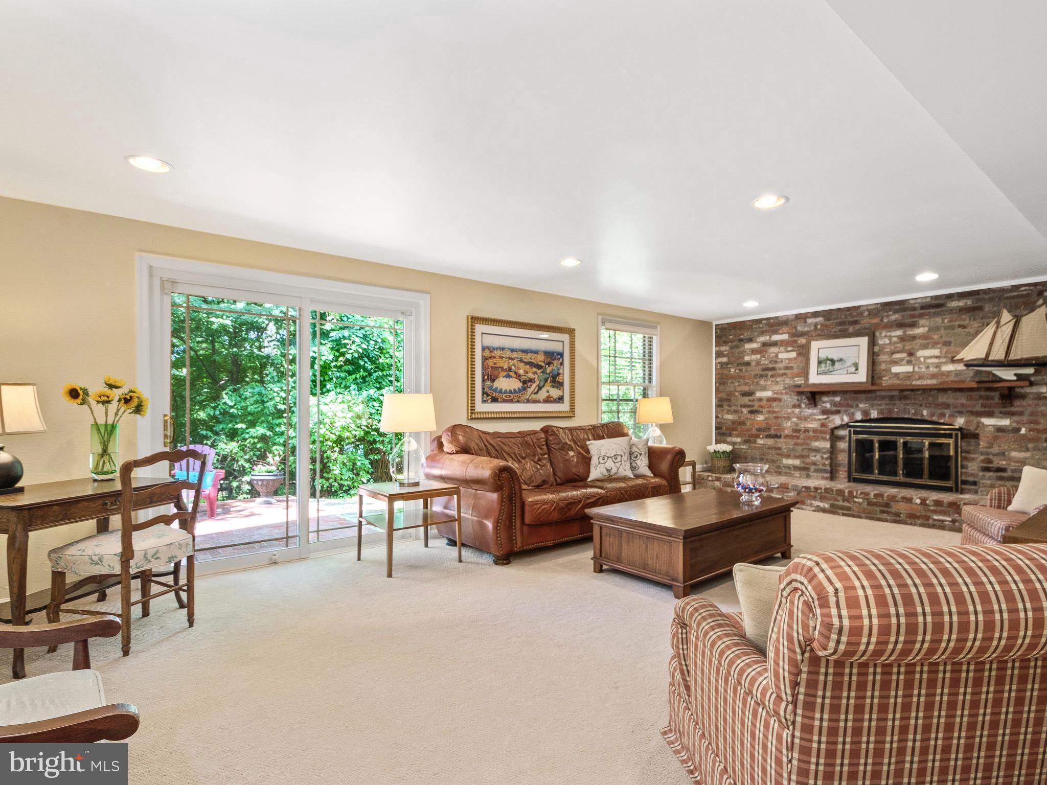 11327 Rolling House Road Rockville, MD 20852 - Photo 21 of 51 Family Room with sliding doors to the Patio
