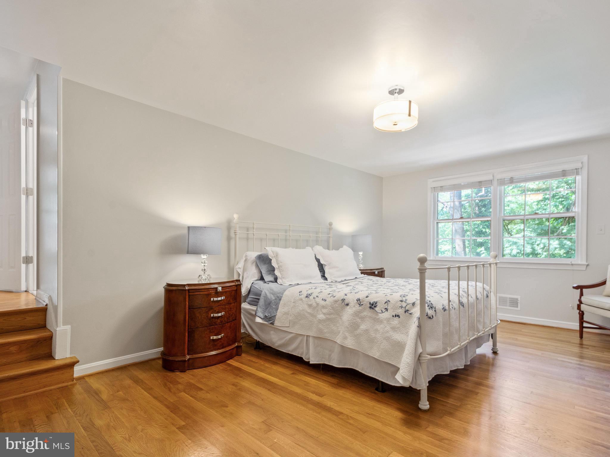 11327 Rolling House Road Rockville, MD 20852 - Photo 27 of 51 Master Bedroom with Beaming Hardwood Floors