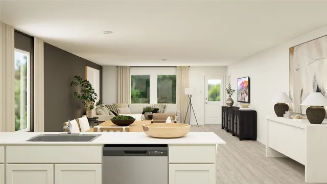 a kitchen with a sink and a refrigerator