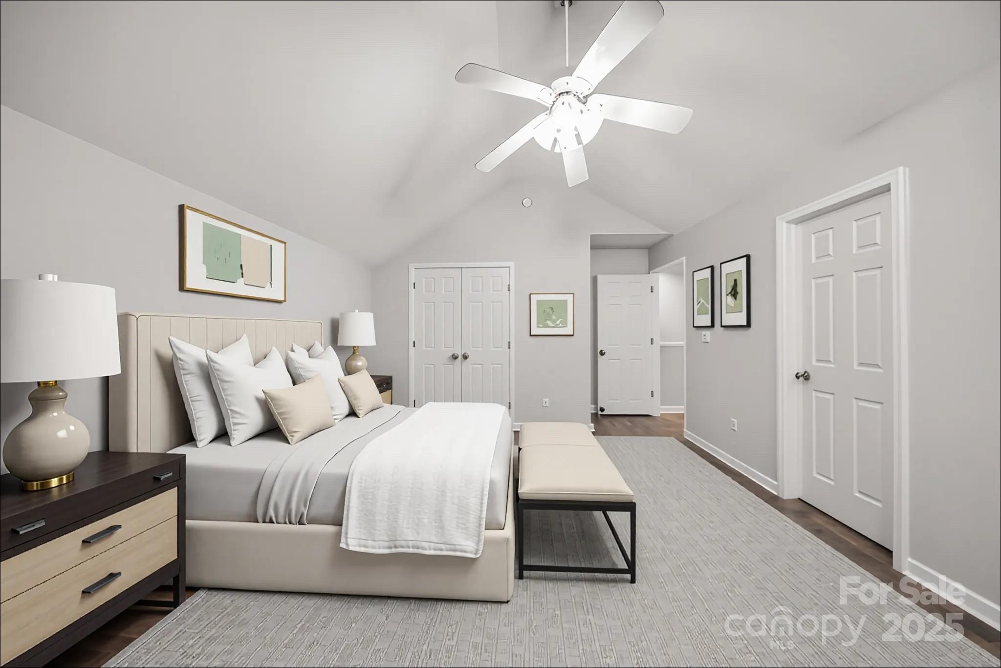 3056 Rocket Road Rock Hill, SC 29732 - Photo 30 of 33 a spacious bedroom with a bed and a chandelier