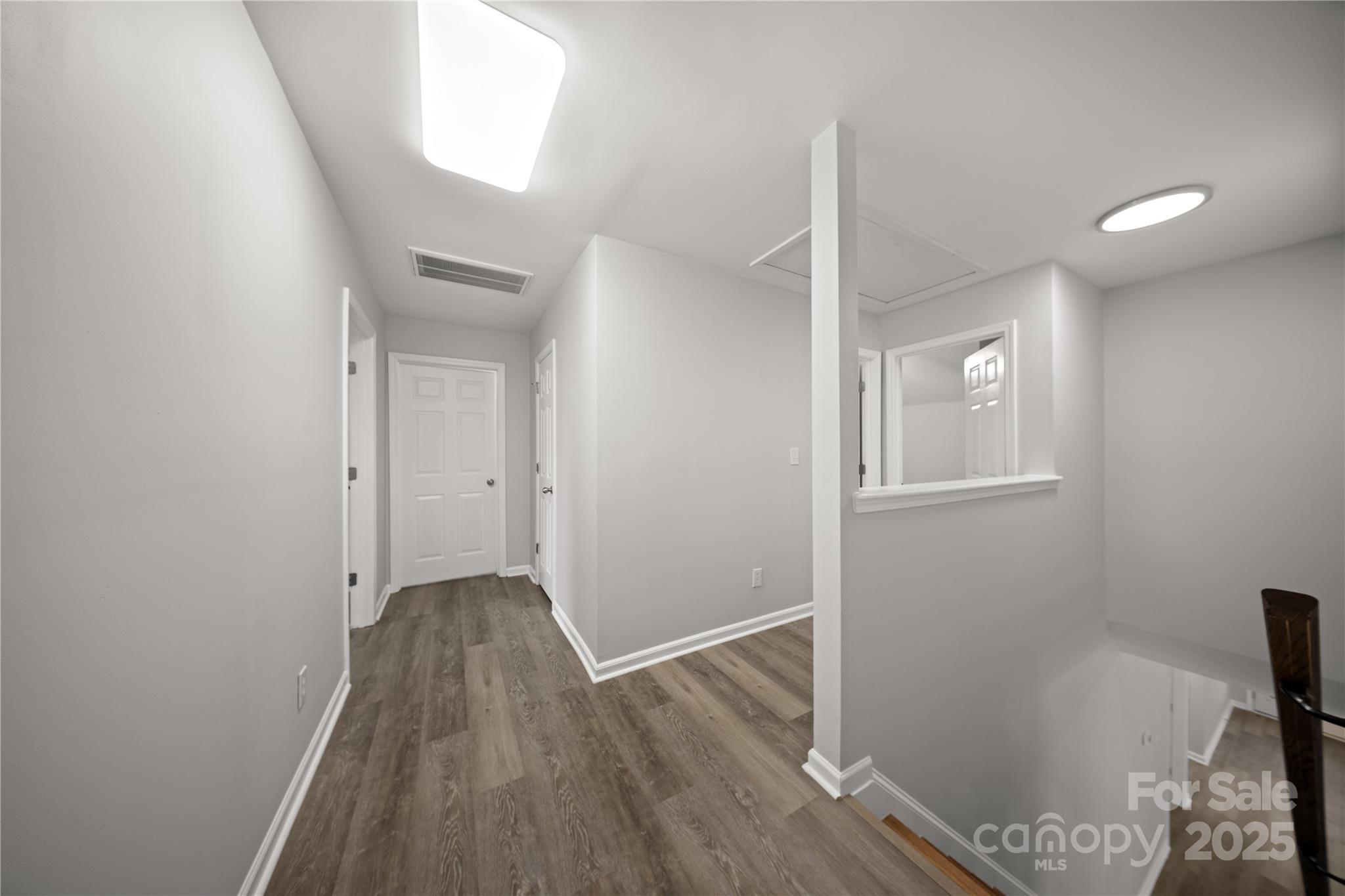 3056 Rocket Road Rock Hill, SC 29732 - Photo 31 of 33 wooden floor in an empty room with a window