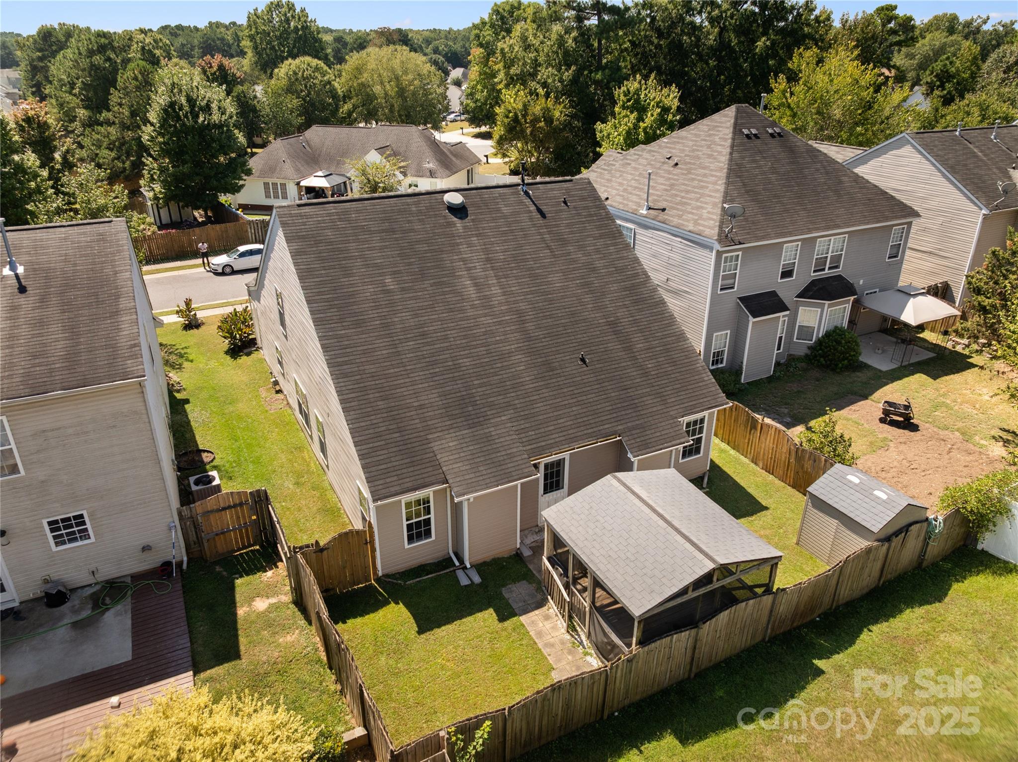 3056 Rocket Road Rock Hill, SC 29732 - Photo 33 of 33 an aerial view of a house with swimming pool and large trees