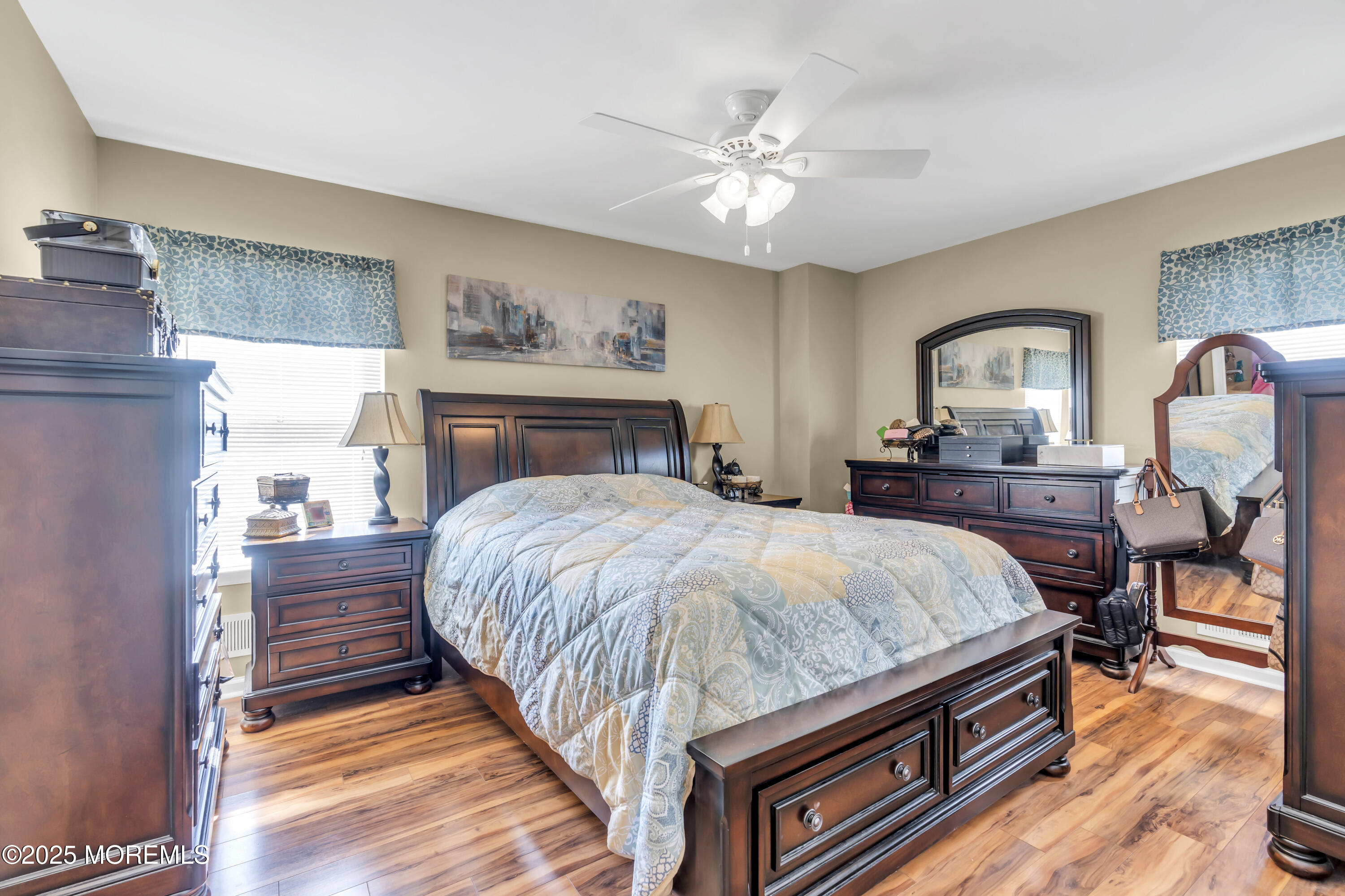 19 Sally Street Howell, NJ 07731 - Photo 14 of 31 a bed sitting in a bedroom with a bed and furniture