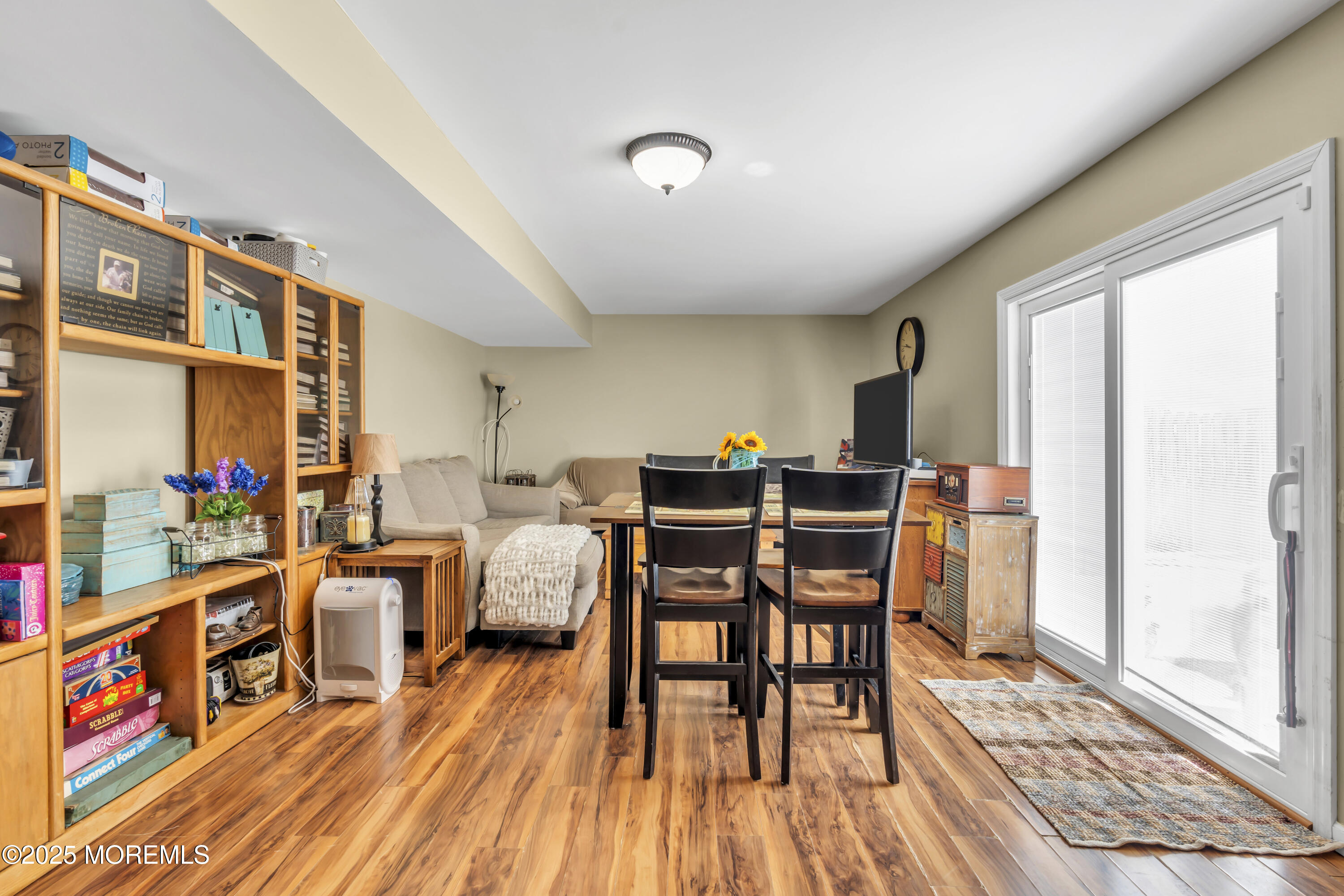 19 Sally Street Howell, NJ 07731 - Photo 19 of 31 a dining room with furniture and wooden floor