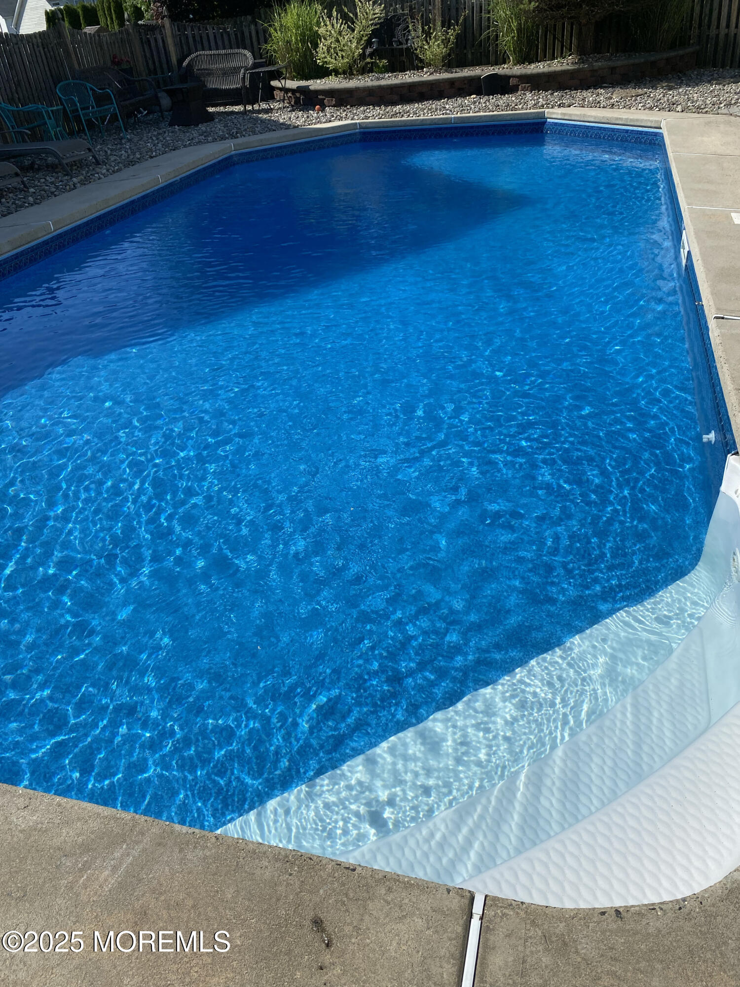 19 Sally Street Howell, NJ 07731 - Photo 24 of 31 a view of swimming pool with seating area