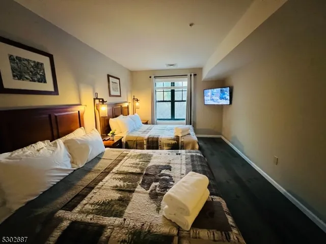 a bathroom with a bathtub and a toilet