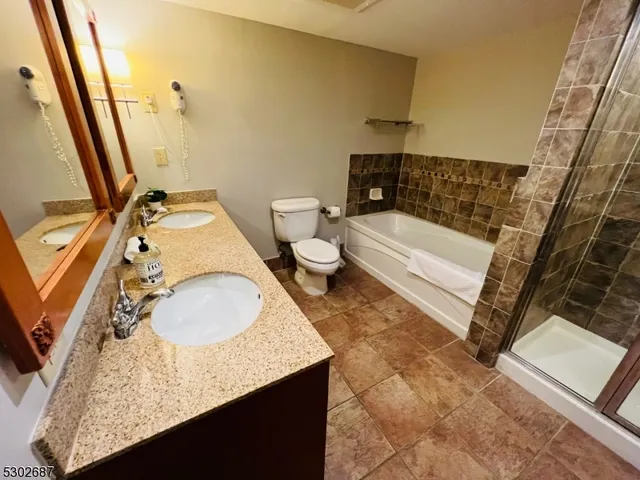 a view of a garden with houses