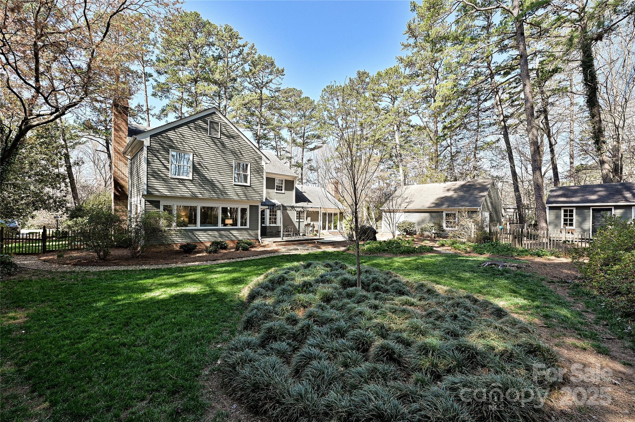 525 Pine Road Davidson, NC 28036 - Photo 31 of 33 a view of a house with a yard