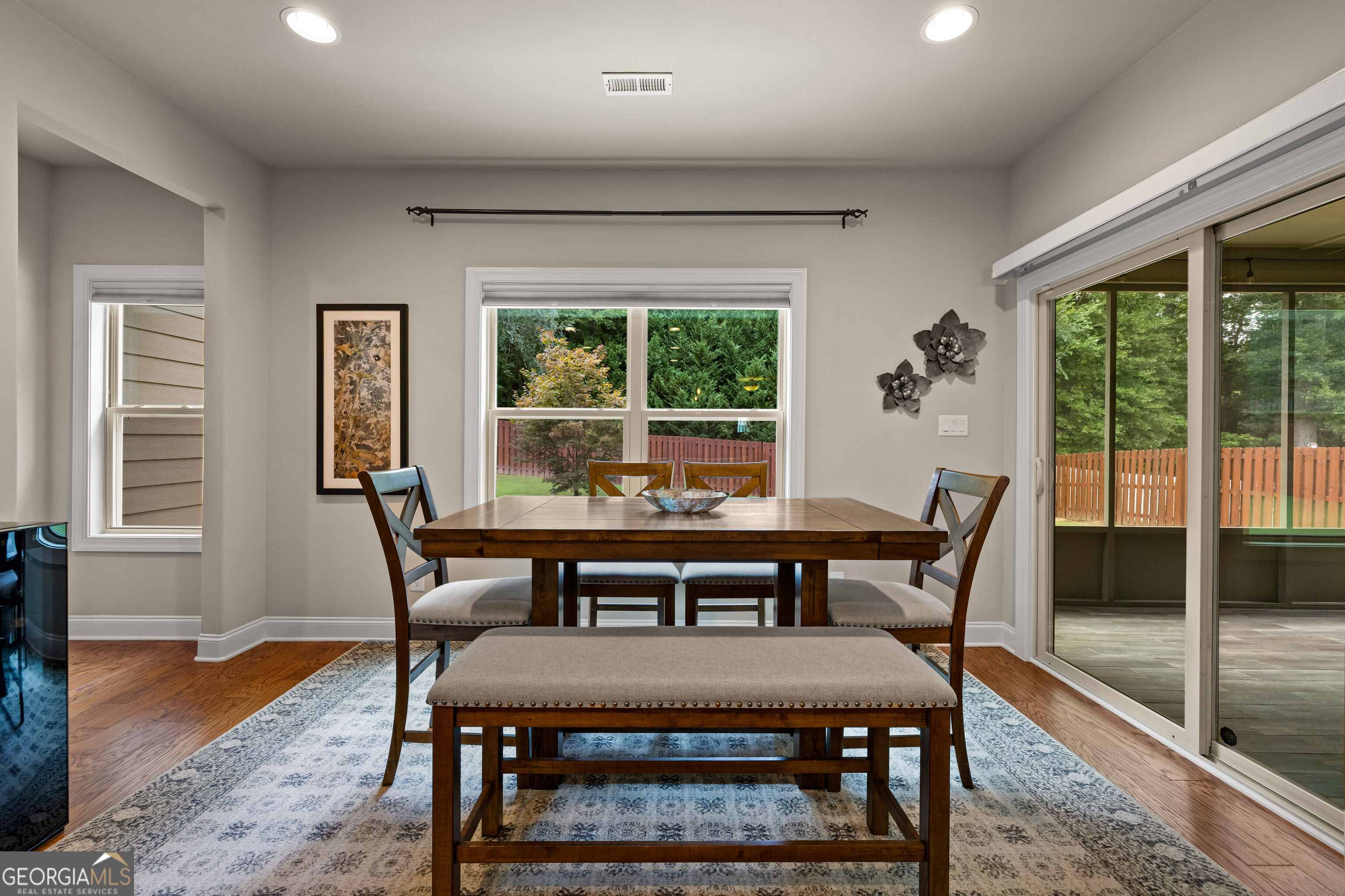 12 Delaware Way Newnan, GA 30265 - Photo 17 of 61 Breakfast nook with a view to the living room and access to the outdoor patio.