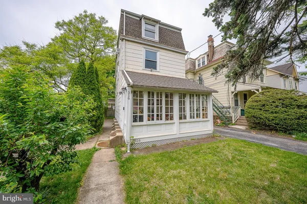 a view of a house with a garden