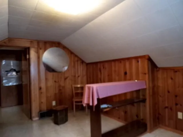 a front view of a house with a bathtub