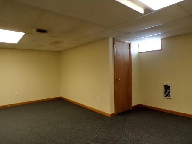 a view of a room with a hallway