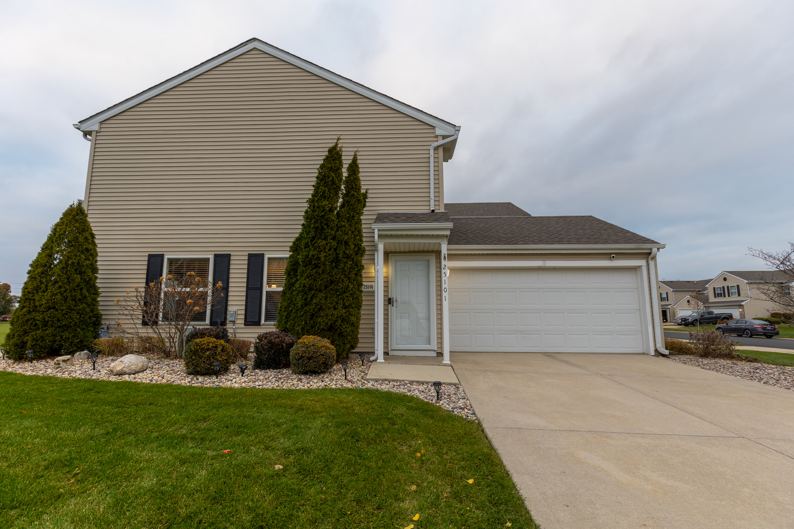 25101 Faraday Road Manhattan, IL 60442 - Photo 22 of 26 a front view of house with garage and yard