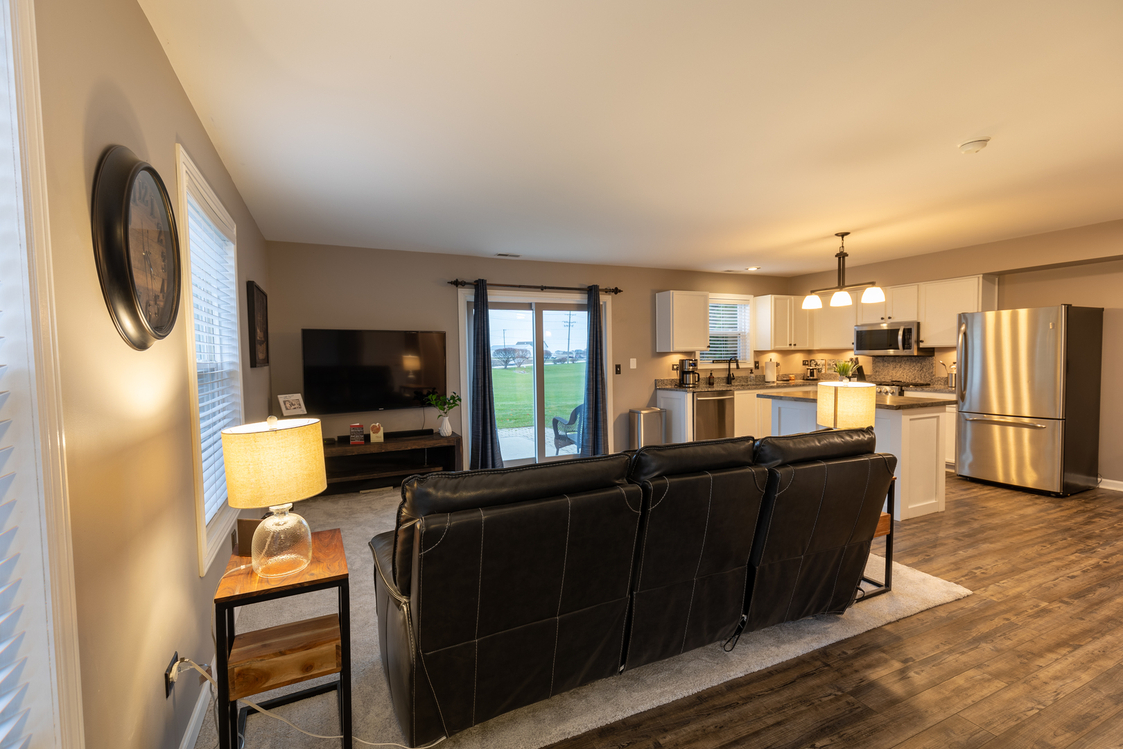 25101 Faraday Road Manhattan, IL 60442 - Photo 9 of 26 a living room with furniture and a flat screen tv