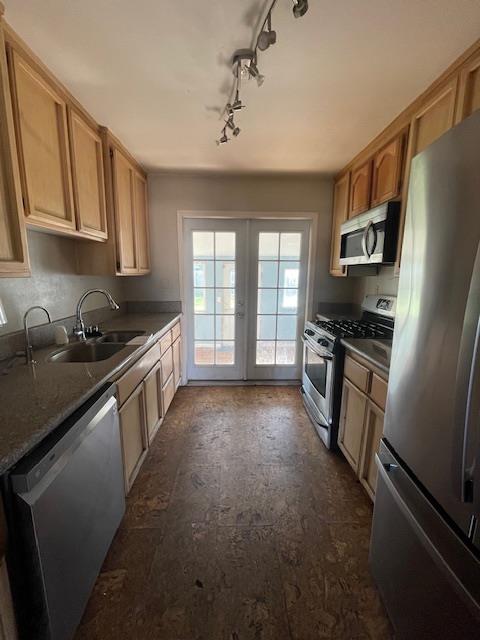 450 Lilac Lane Rio Linda, CA 95673 - Photo 5 of 12 a kitchen with stainless steel appliances a refrigerator a sink a stove top oven and a dishwasher