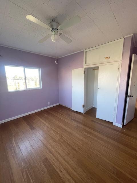 450 Lilac Lane Rio Linda, CA 95673 - Photo 9 of 12 an empty room with wooden floor and windows