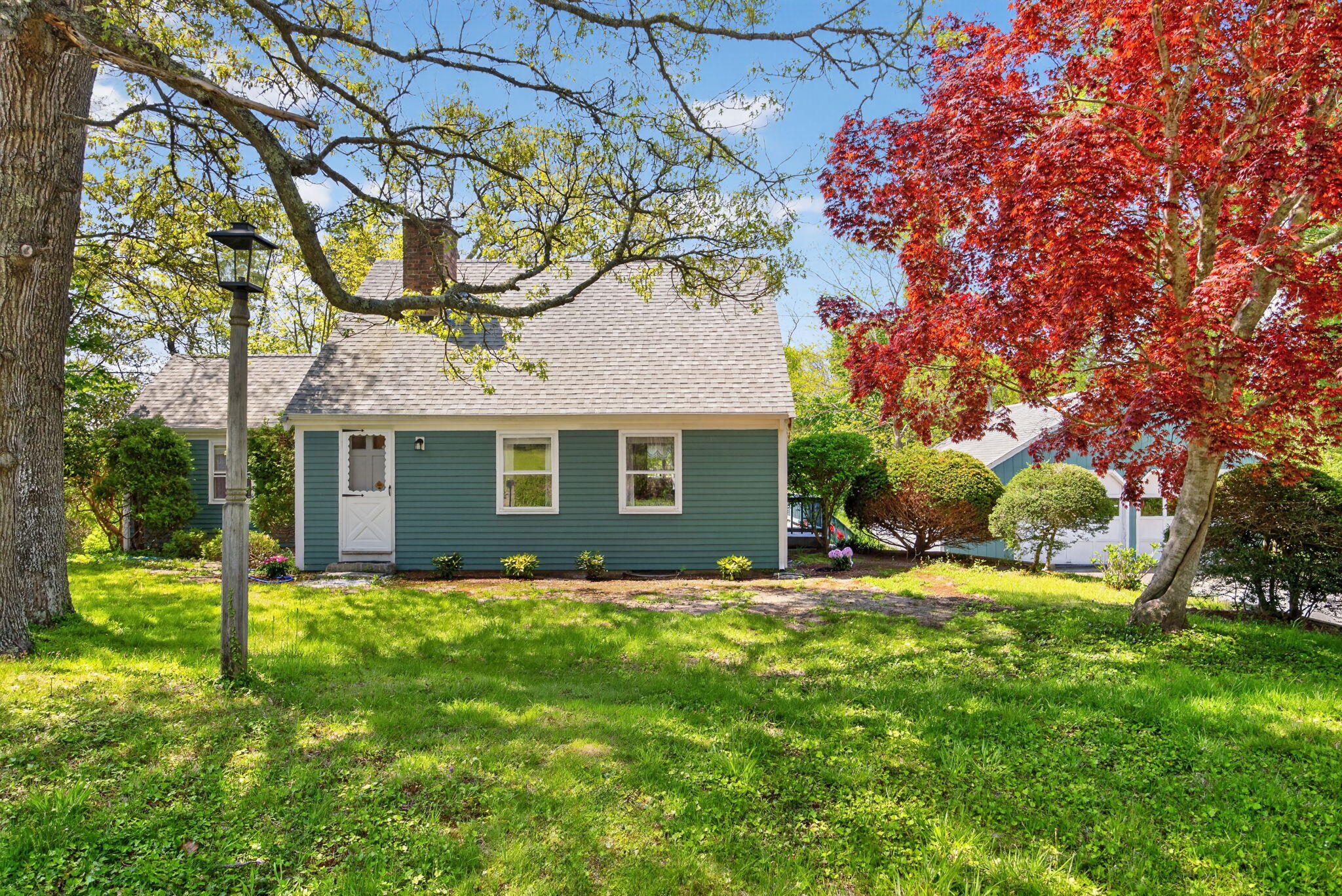 23 Nickerson Road Orleans, MA 02653 - Photo 1 of 54 a view of a house with a yard