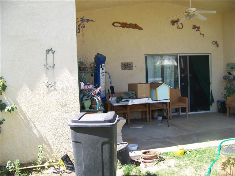 68220 Santelmo Road Cathedral City, CA 92234 - Photo 6 of 21 a living room with furniture and a table