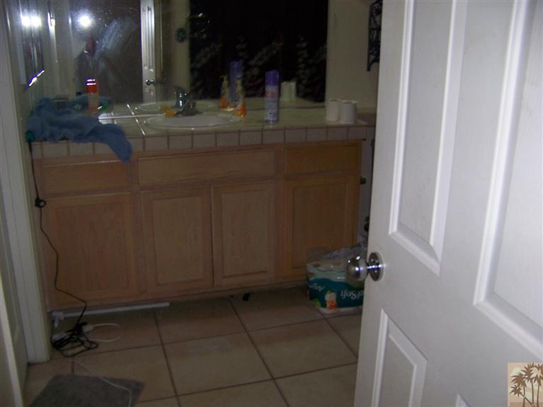 68220 Santelmo Road Cathedral City, CA 92234 - Photo 8 of 21 a bathroom with a sink and a mirror