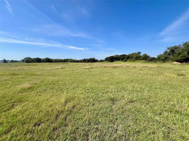a view of an ocean and a mountain