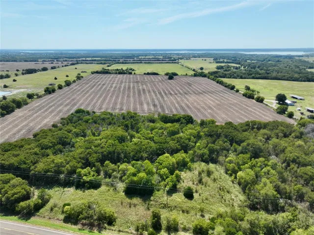 a view of a lake with a mountain in the background