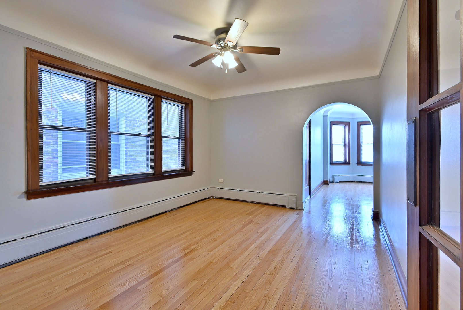1835 Home Avenue Berwyn, IL 60402 - Photo 17 of 30 a view of an empty room with window and wooden floor