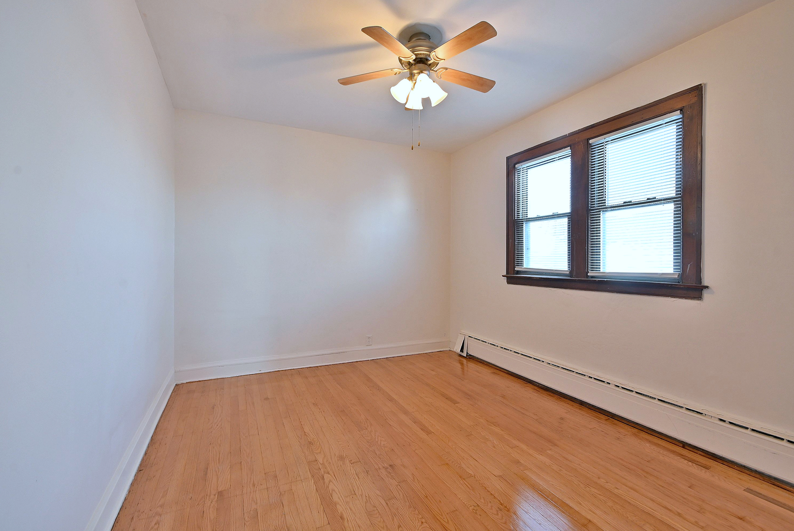 1835 Home Avenue Berwyn, IL 60402 - Photo 7 of 30 a view of empty room with window