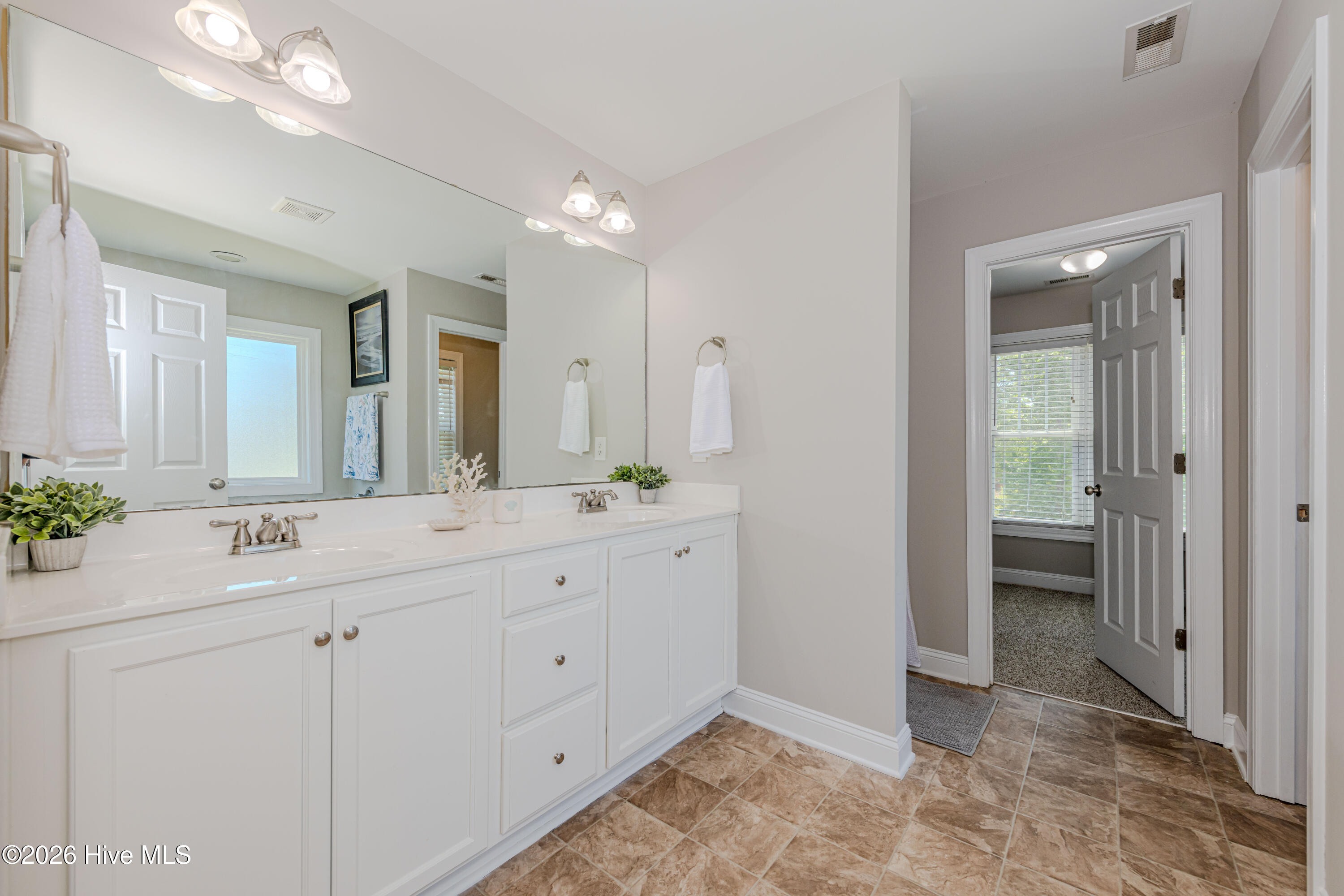 673 Morris Landing Road Holly Ridge, NC 28445 - Photo 78 of 125 Primary bathroom