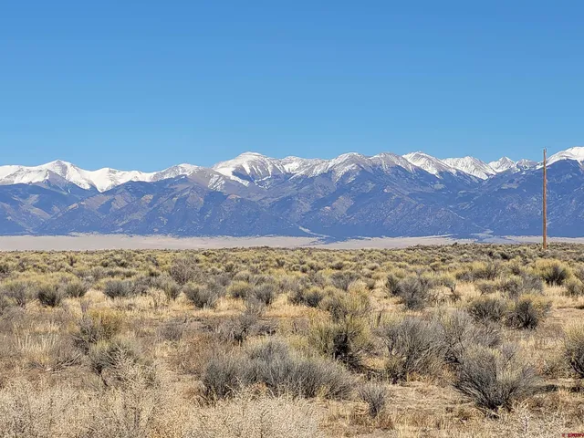 a view of a city with mountain in the background