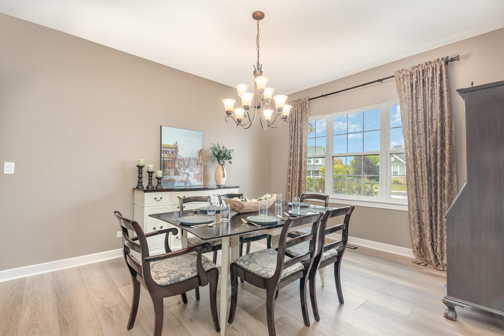 2576 Lyman Loop Yorkville, IL 60560 - Photo 17 of 52 a dining room with furniture a chandelier and window