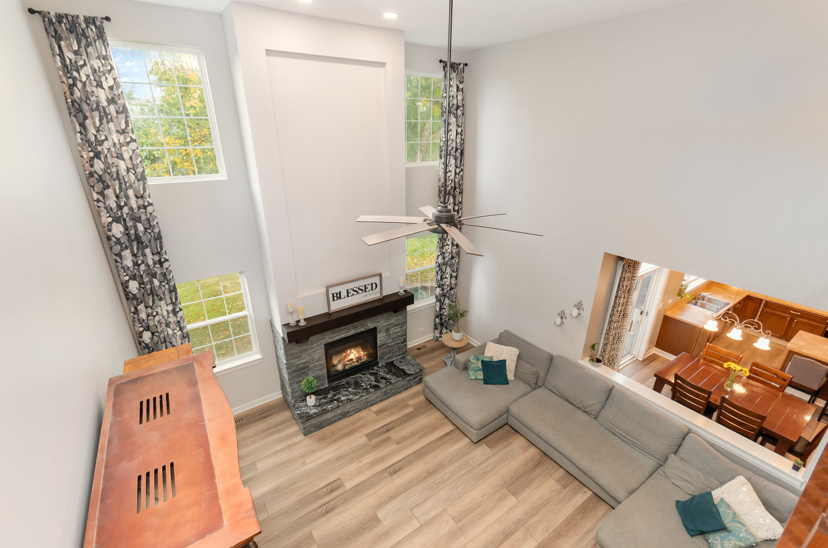 2576 Lyman Loop Yorkville, IL 60560 - Photo 26 of 52 a living room with furniture and a fireplace