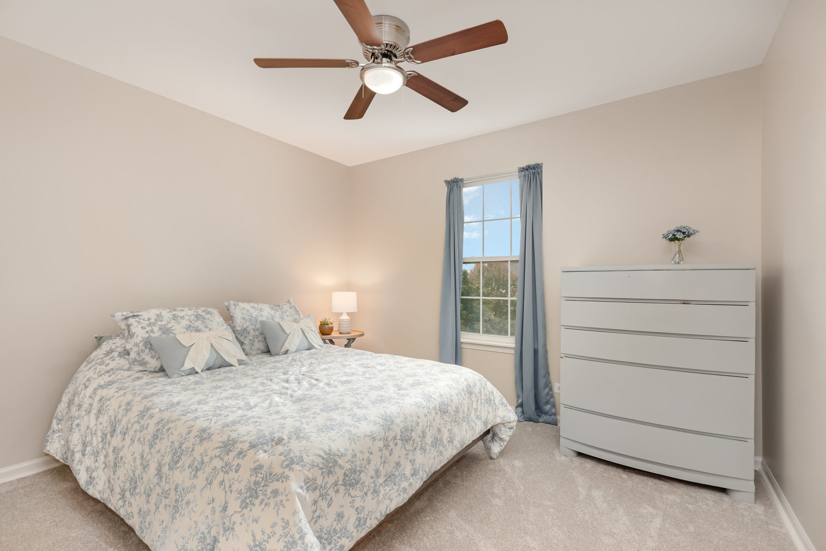 2576 Lyman Loop Yorkville, IL 60560 - Photo 34 of 52 a bedroom with a bed and a ceiling fan