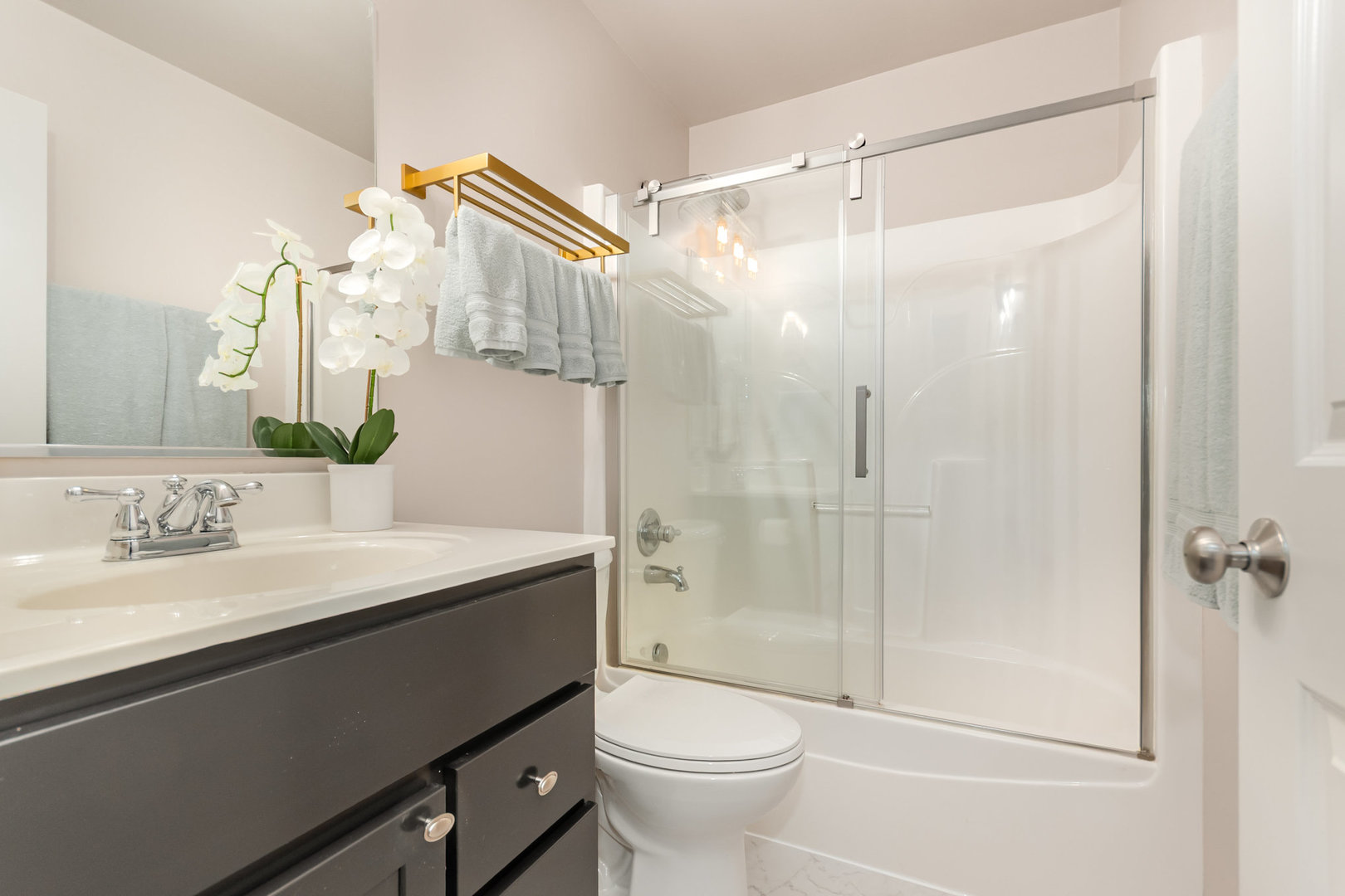 2576 Lyman Loop Yorkville, IL 60560 - Photo 35 of 52 a bathroom with a sink a toilet and shower