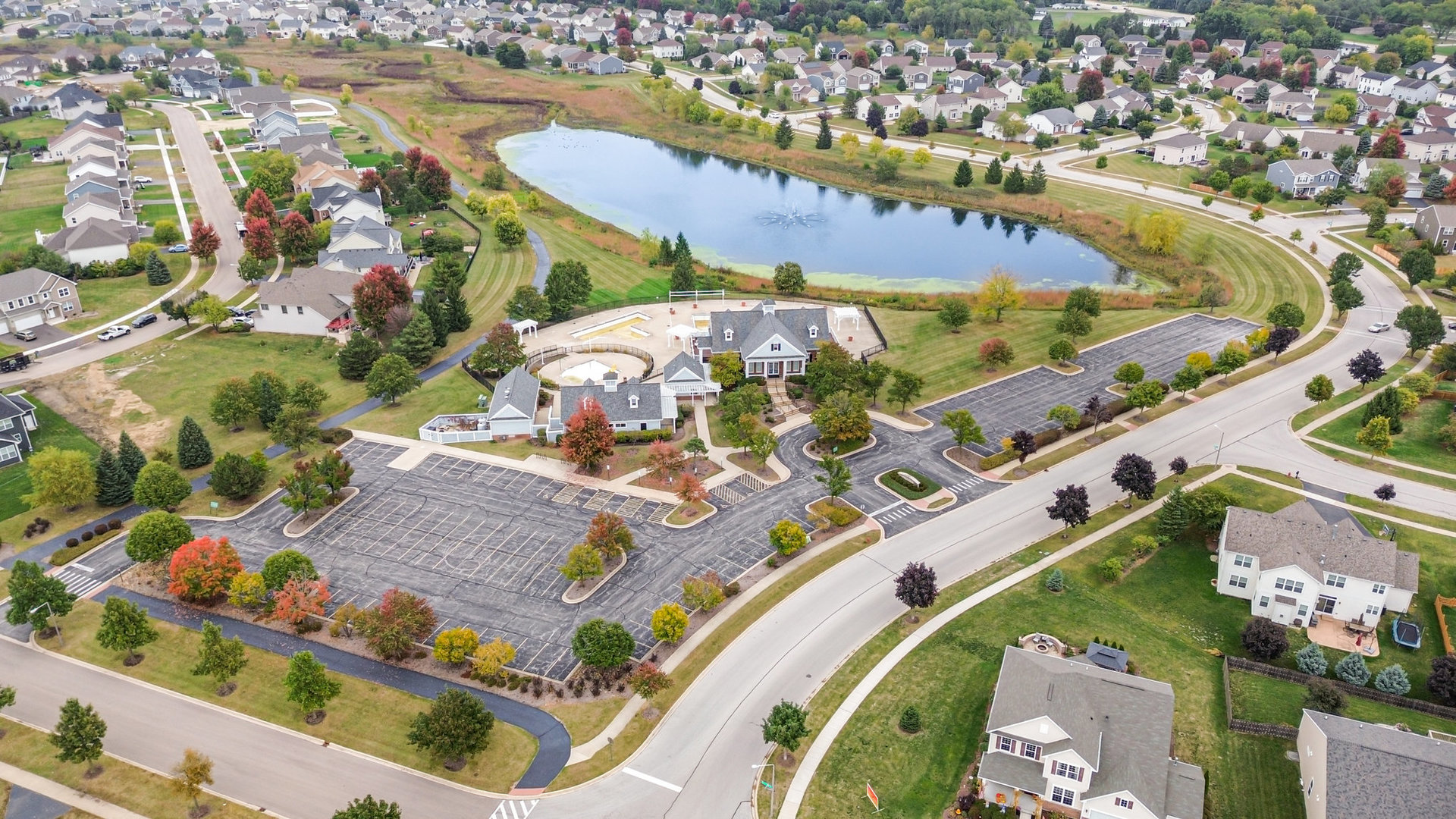 2576 Lyman Loop Yorkville, IL 60560 - Photo 43 of 52 an aerial view of a swimming pool a yard and mountain view in back